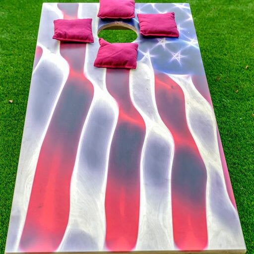 Challenge your friends to a classic game of cornhole on this patriotic board. Perfect for backyard fun and outdoor gatherings.