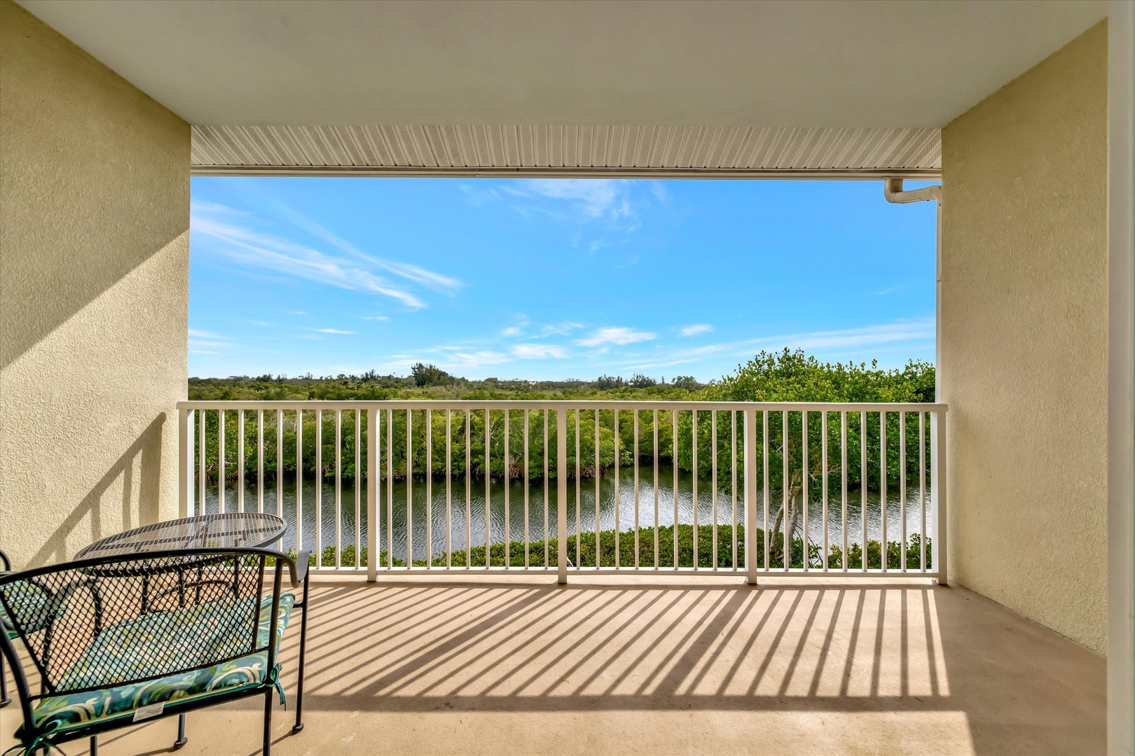 Step onto your private balcony and breathe in the fresh air as you take in sweeping views of lush greenery and tranquil water. Morning coffee or evening sunsets feel effortless here.