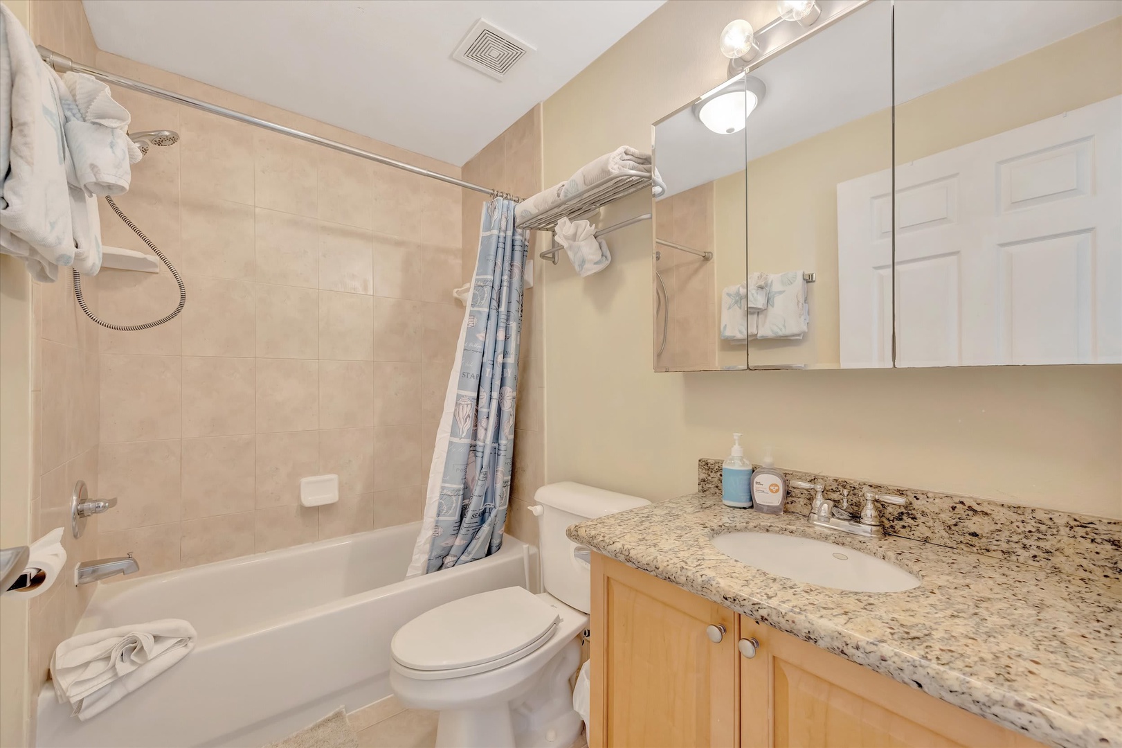 Freshen up in your private bathroom with a tub-shower combo, granite vanity, and plush towels waiting for you after a day of adventure.