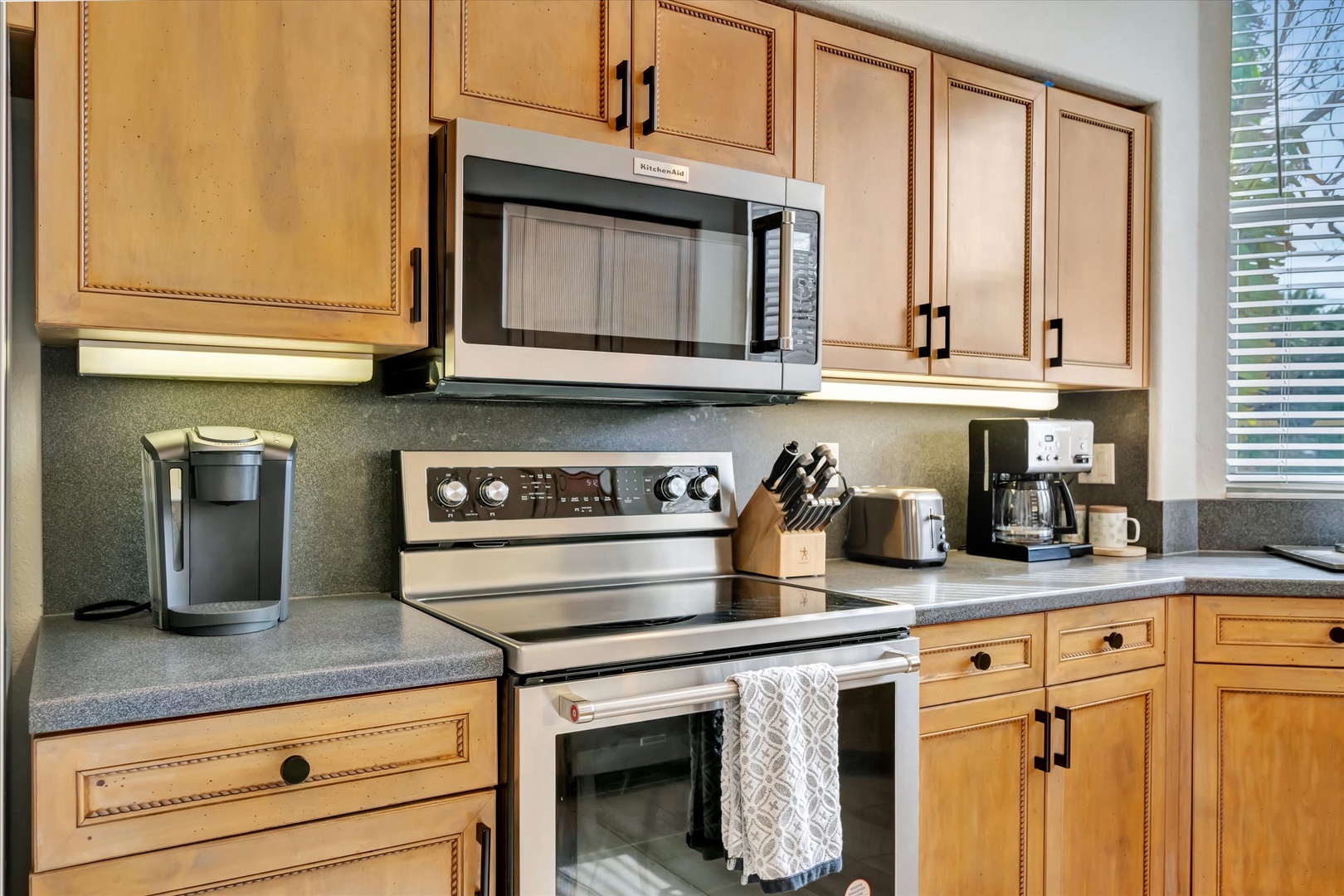 Your fully equipped kitchen makes meal prep a breeze, with stainless steel appliances, ample counter space, and everything you need to cook up vacation favorites.