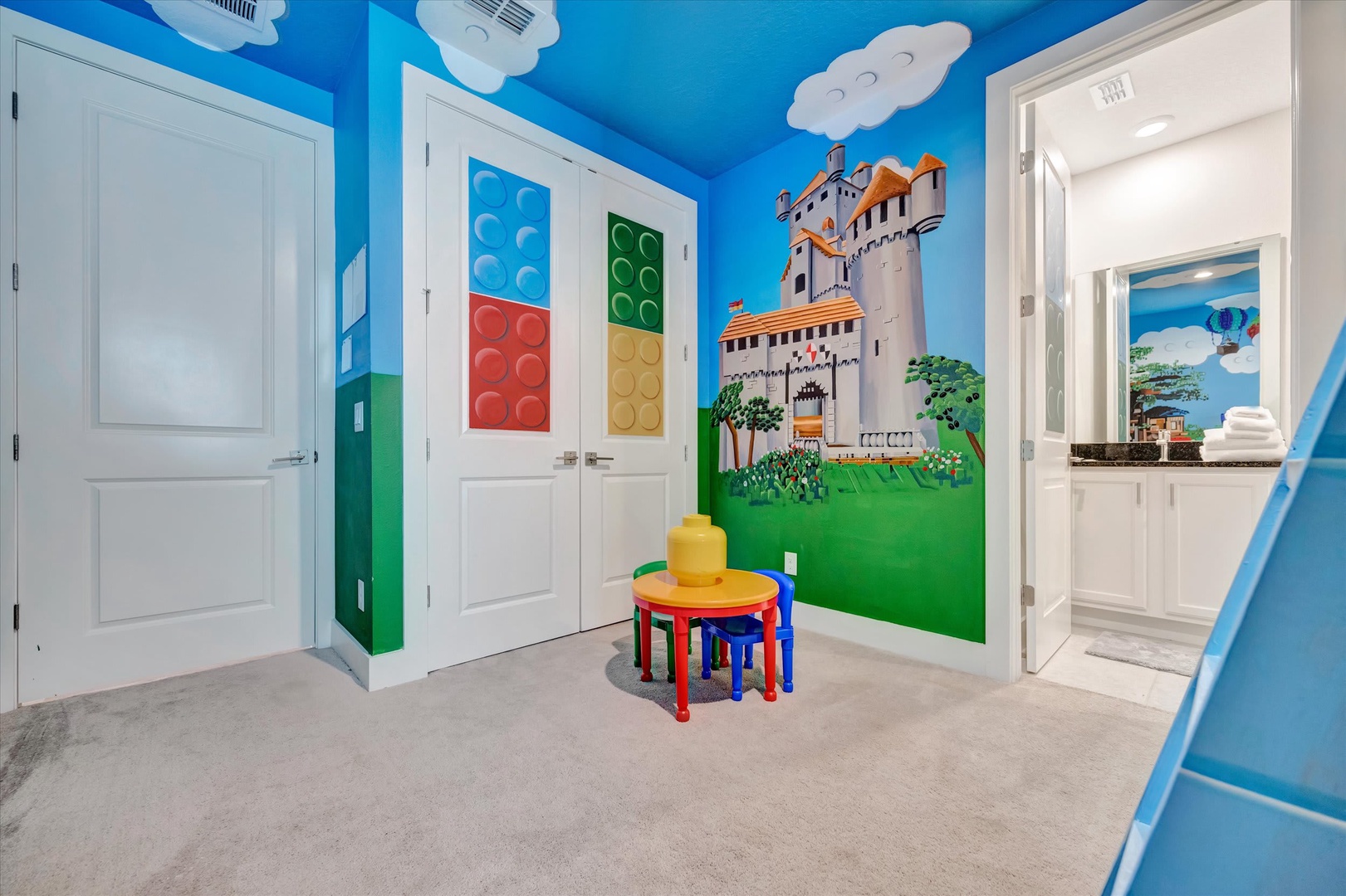 Your little ones will delight in their own magical play space, complete with whimsical murals and a cheerful activity table perfect for building memories together.