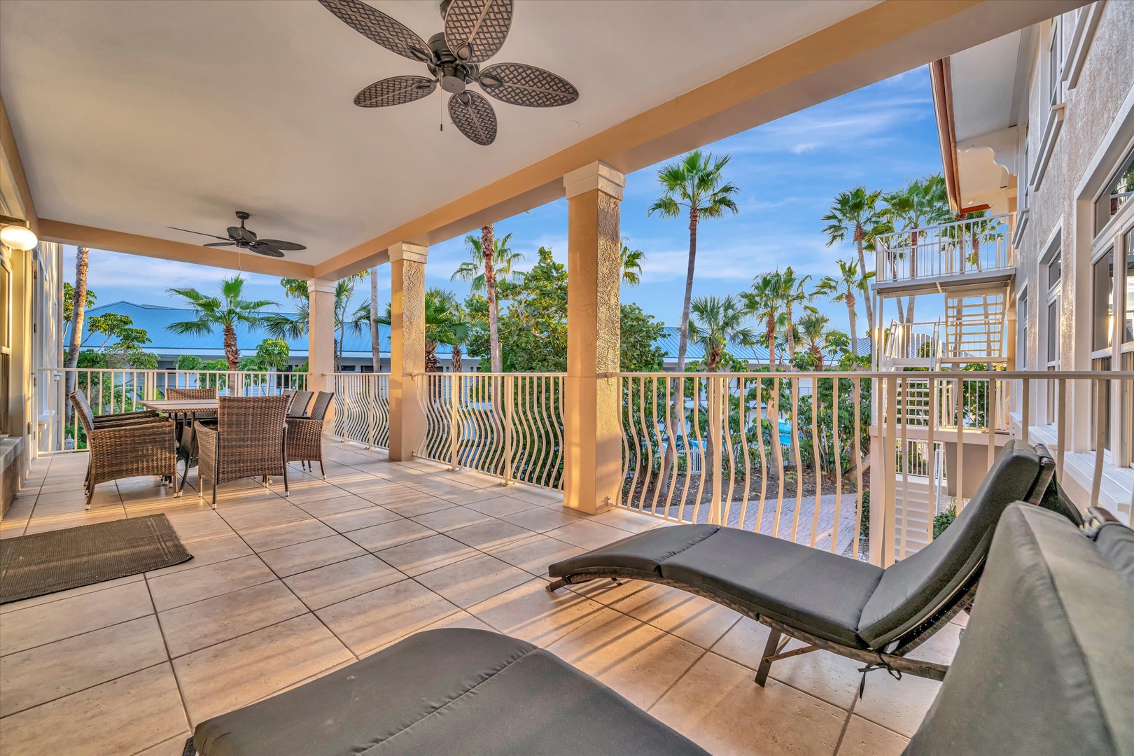 Soak in stunning ocean and palm views from your private covered balcony, where ceiling fans keep you cool as you lounge in comfort or dine al fresco with the sea breeze.