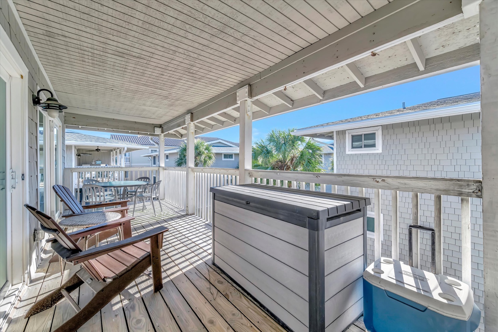 Relax in your private covered balcony with lounge seating, dining space, and coastal breezes—your perfect spot to unwind and soak up the sunshine.