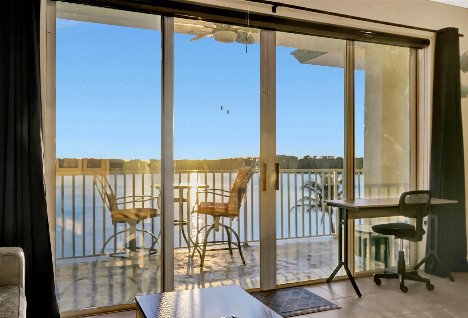Step onto your private balcony and take in the serene water views stretching toward the horizon—a perfect spot for morning coffee or evening unwinding.