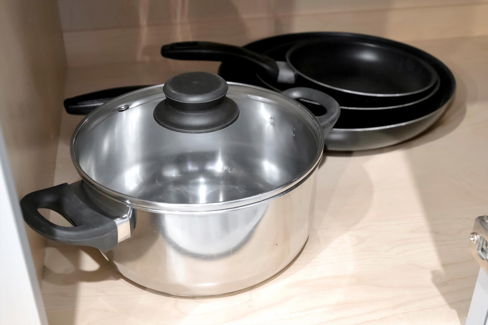 Your kitchen comes stocked with quality cookware—pots, pans, and lids ready for preparing home-cooked meals during your stay.
