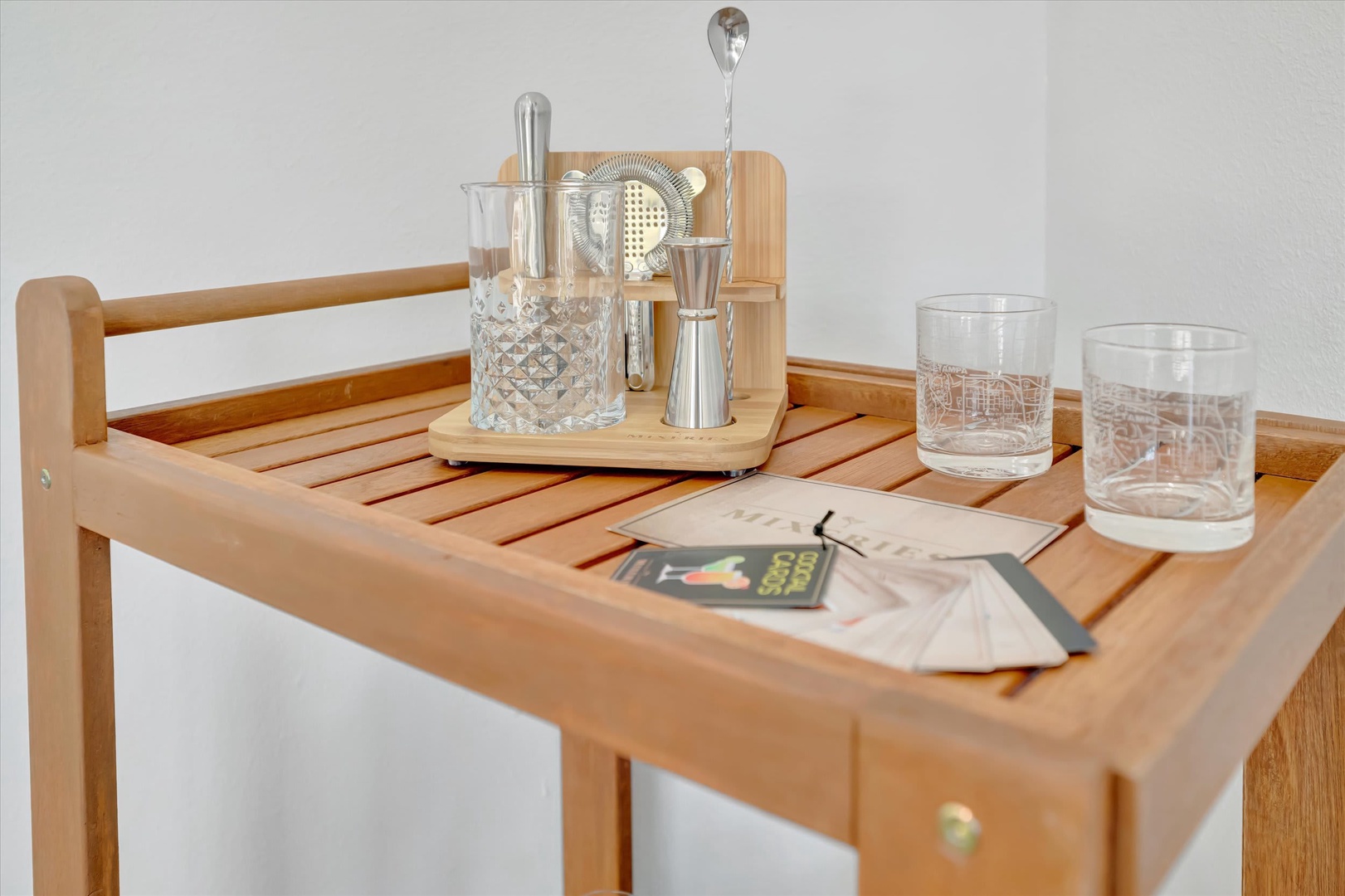 Your bar cart is fully stocked for crafting cocktails—everything you need to mix your favorite drinks and unwind in style.