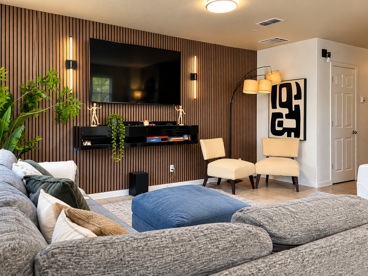 Sink into the plush sofa and unwind in your stylish living space, where modern design meets warm natural textures and ambient lighting sets the perfect mood for relaxation.