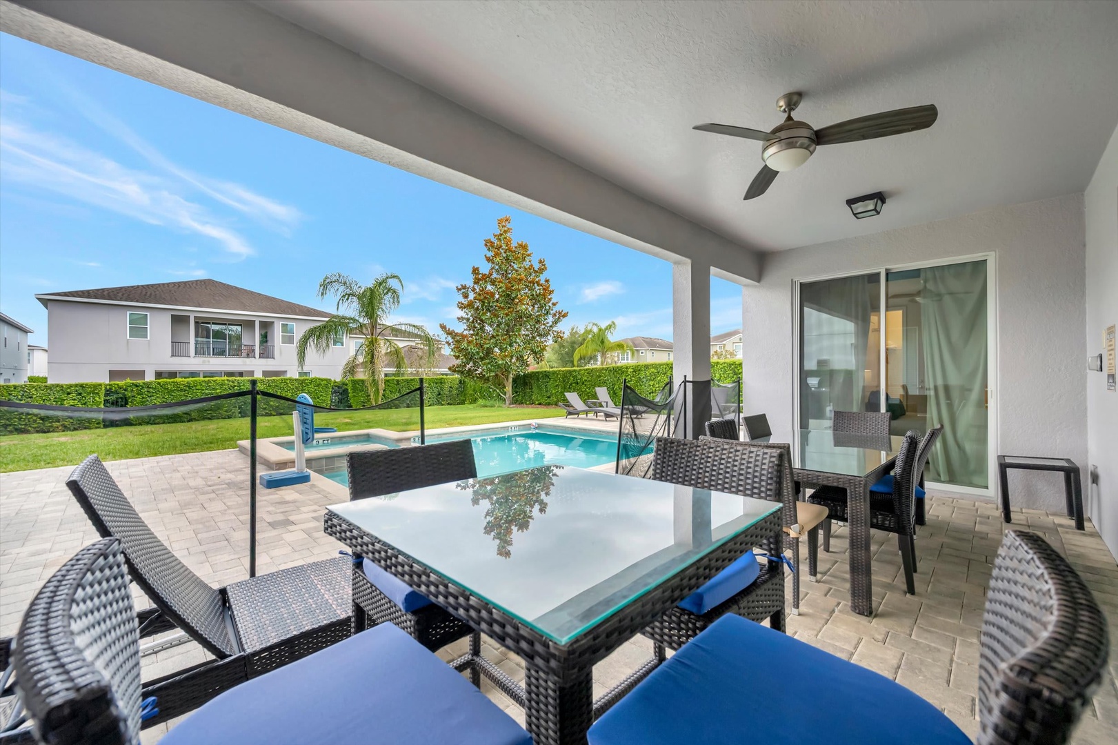 Enjoy your morning coffee or evening cocktails at this covered patio, where you'll have a private pool and lush backyard all to yourselves.