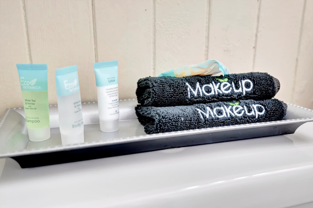 Enjoy thoughtful touches with premium toiletries and soft towels, all set out and ready for your arrival.