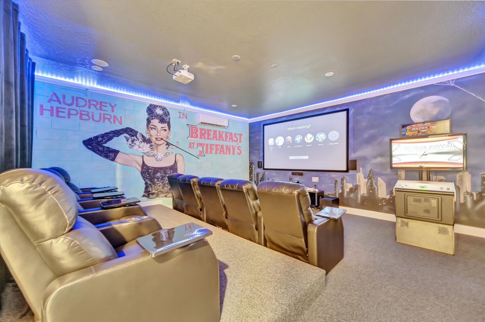 Your private home theater awaits with plush reclining seats, atmospheric LED lighting, and a large projection screen—perfect for movie nights with friends and family.