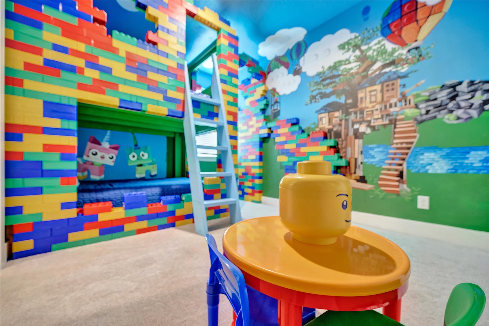 Step into a kid's dream come true—colorful brick-built walls, a cozy bunk nook, and playful details everywhere you look.