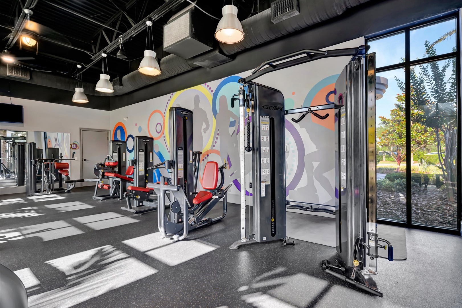 Stay active and energized in your well-equipped fitness center, where modern machines and vibrant surroundings inspire your daily workout routine.