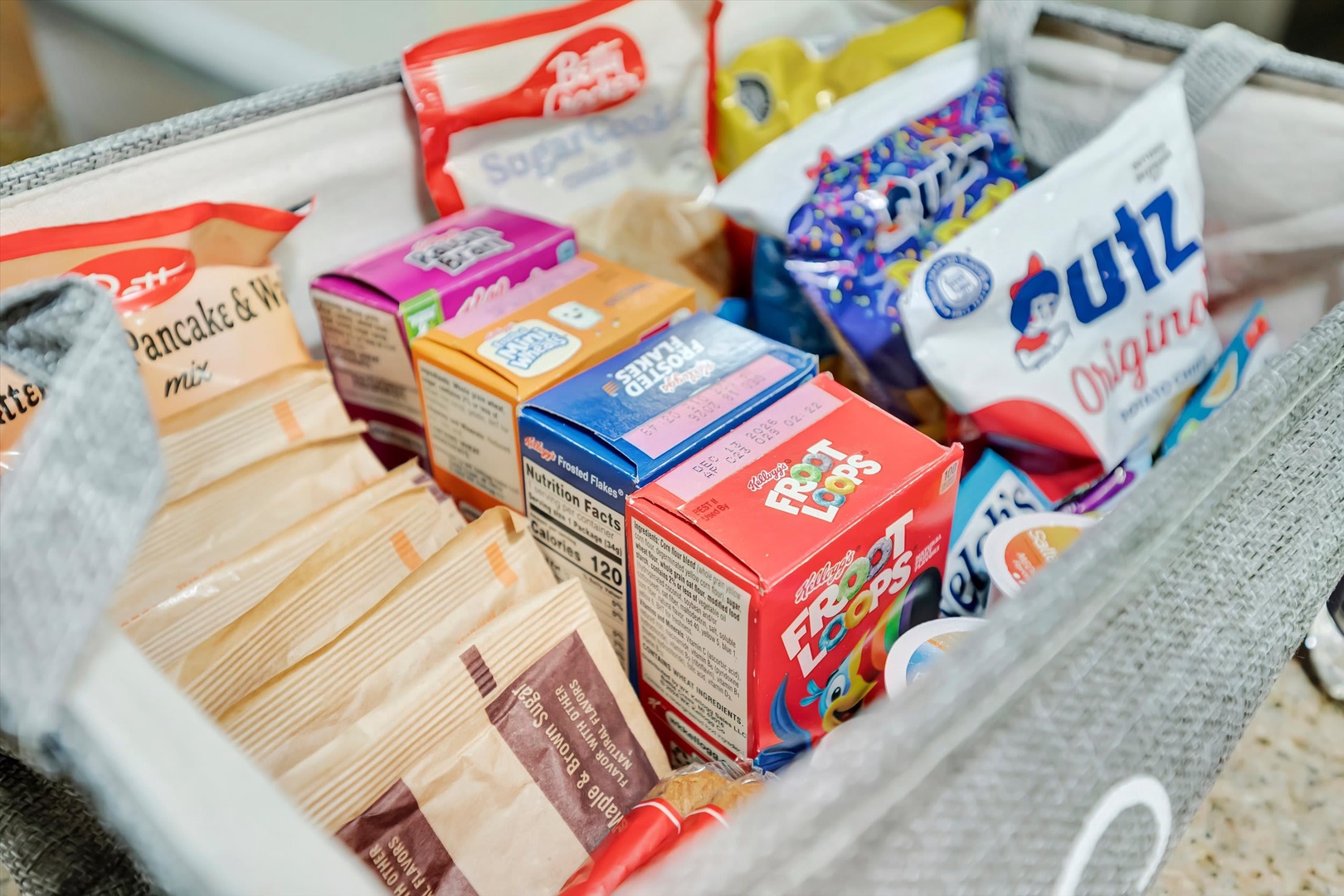 A fully stocked pantry basket keeps your favorite breakfast staples and snacks within easy reach, so you can start each morning just the way you like.