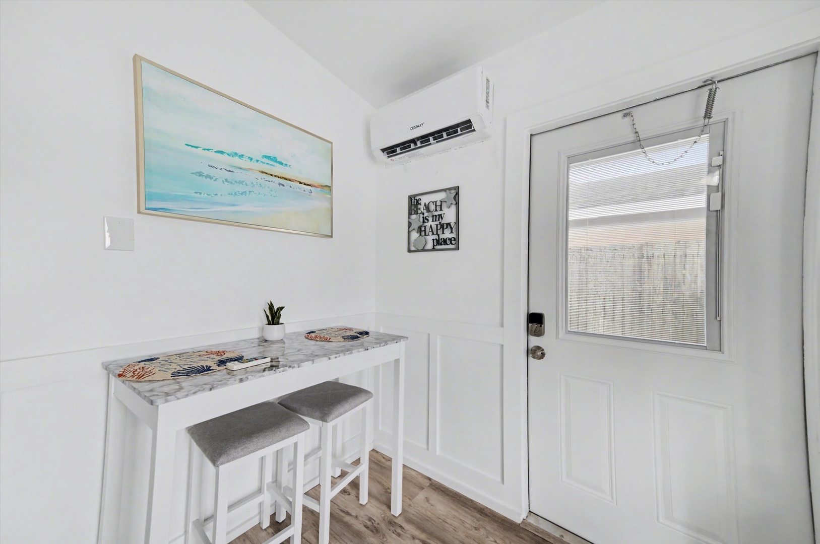 Step into your bright, airy space where coastal vibes meet modern comfort. Settle in at your breakfast nook for morning coffee before heading out to explore, or unwind after a beach day in climate-controlled relaxation.