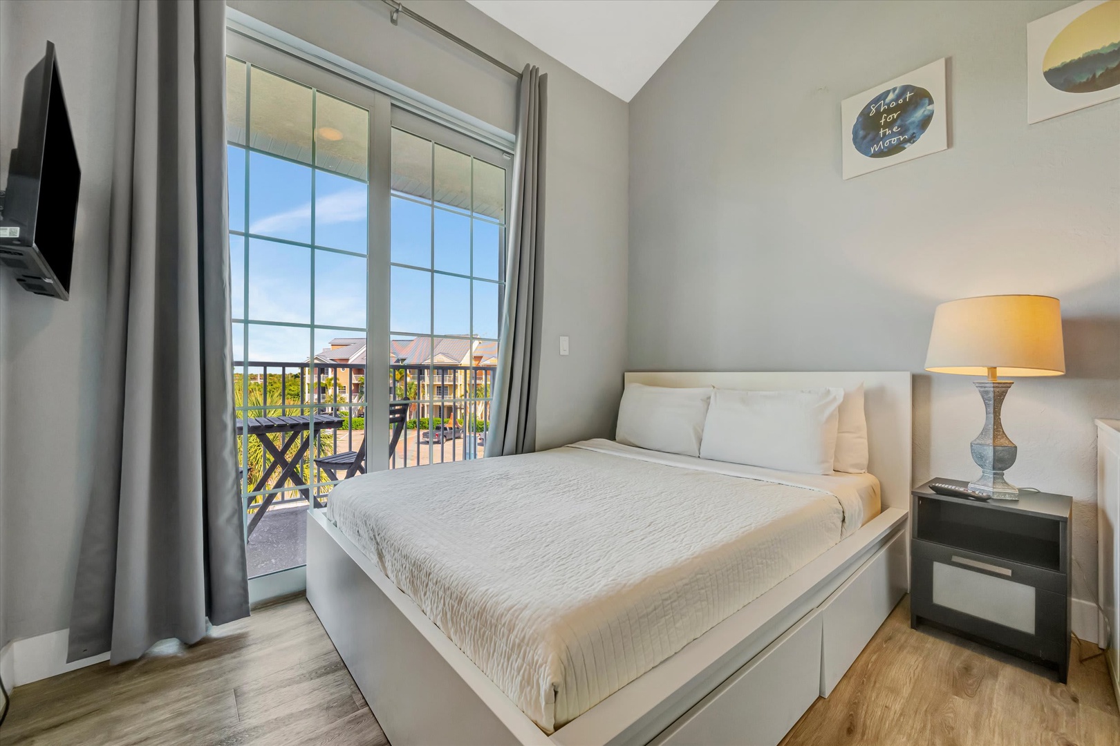 Sink into your soft bed and let the natural light wash over you. Step onto your private balcony and take in the neighborhood views, then retreat inside to unwind with your favorite show.