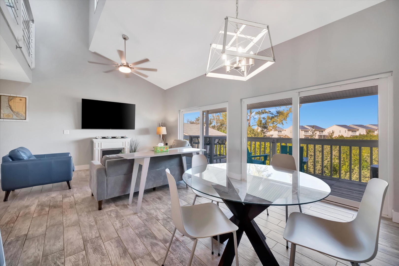Relax in this bright, modern living space featuring vaulted ceilings, stylish lighting, and peaceful views of the surrounding neighborhood. The open layout flows to your private balcony, perfect for morning coffee.