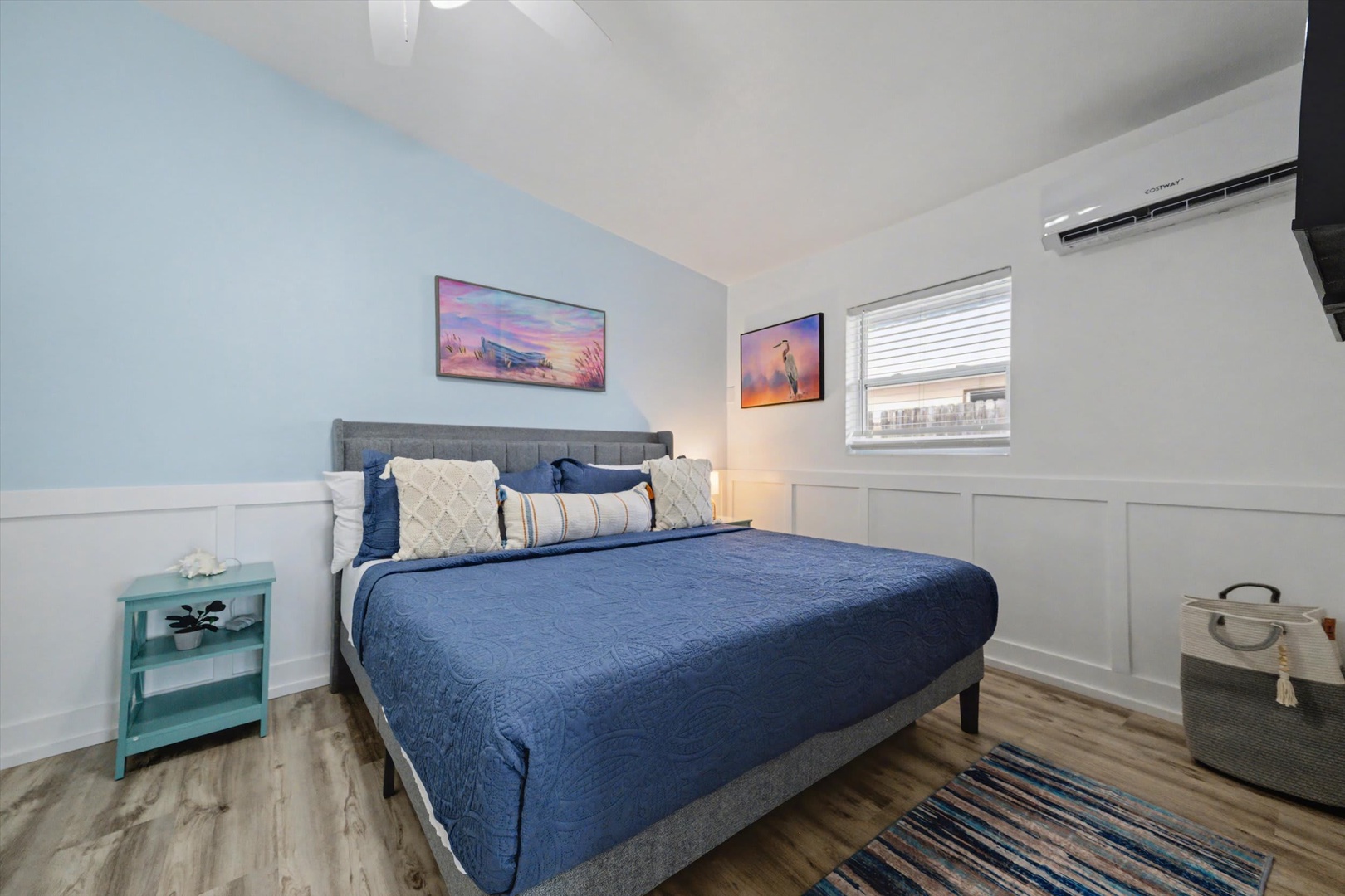 Slip into crisp linens and drift off in your cozy coastal retreat. Cool blue tones and thoughtful touches create a restful escape after your adventures.