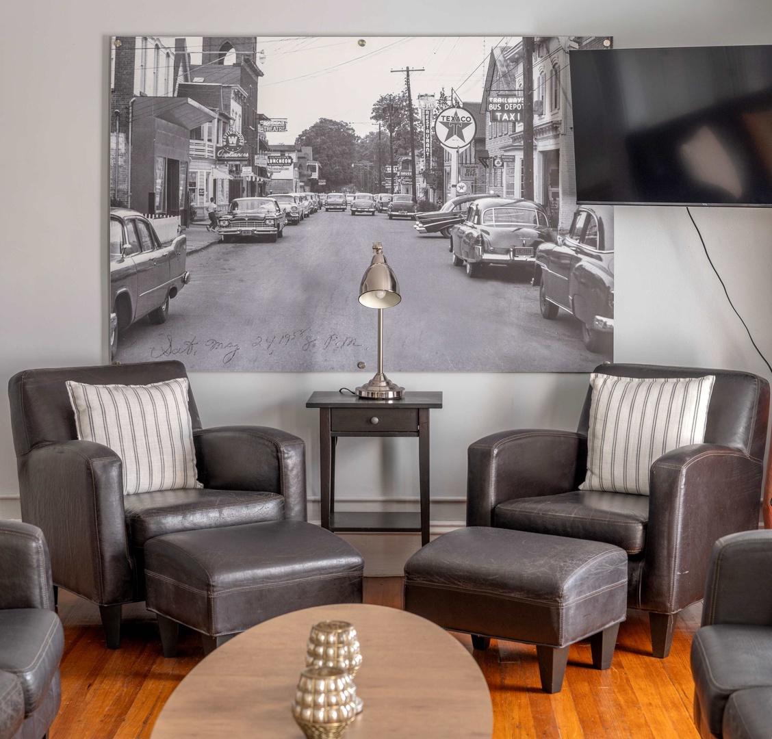 Settle into your cozy seating area and unwind after a day of exploring. The vintage charm adds character while you relax in comfort.