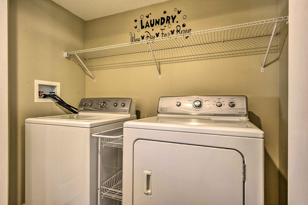 Your dedicated laundry room makes it easy to keep things fresh during your stay, with a full-size washer and dryer and convenient hanging space overhead.
