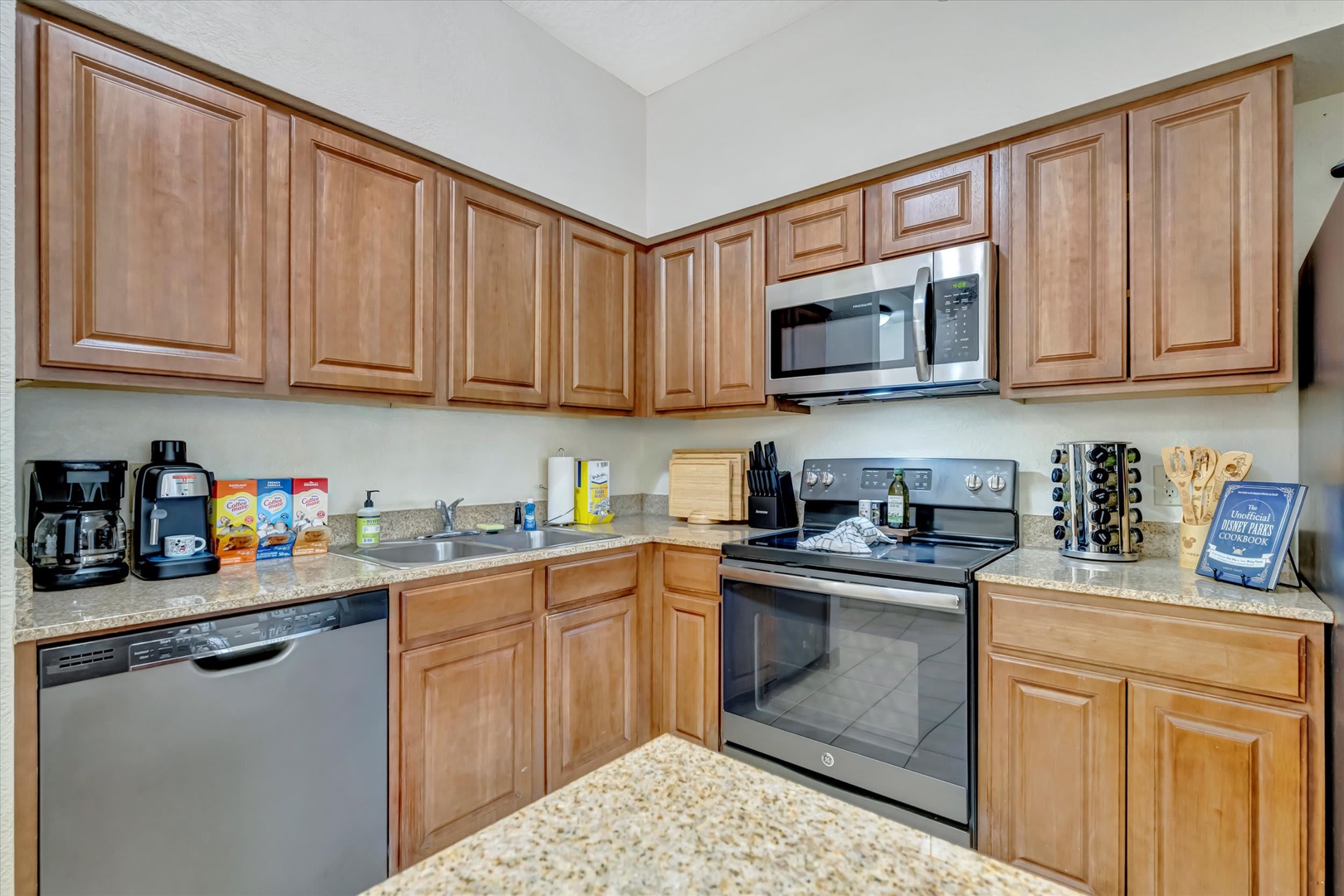 Your fully equipped kitchen with stainless-steel appliances and granite countertops makes meal prep easy and enjoyable, whether you're brewing morning coffee or cooking a family dinner.