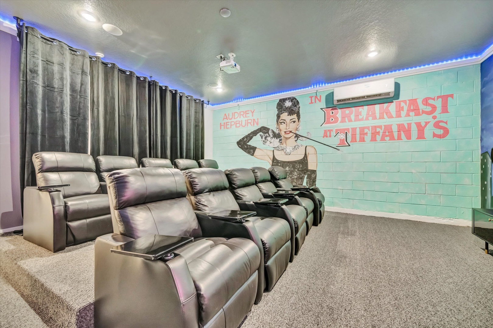 Settle into your private home theater with luxurious reclining seats and atmospheric LED lighting—perfect for movie nights with family or friends.