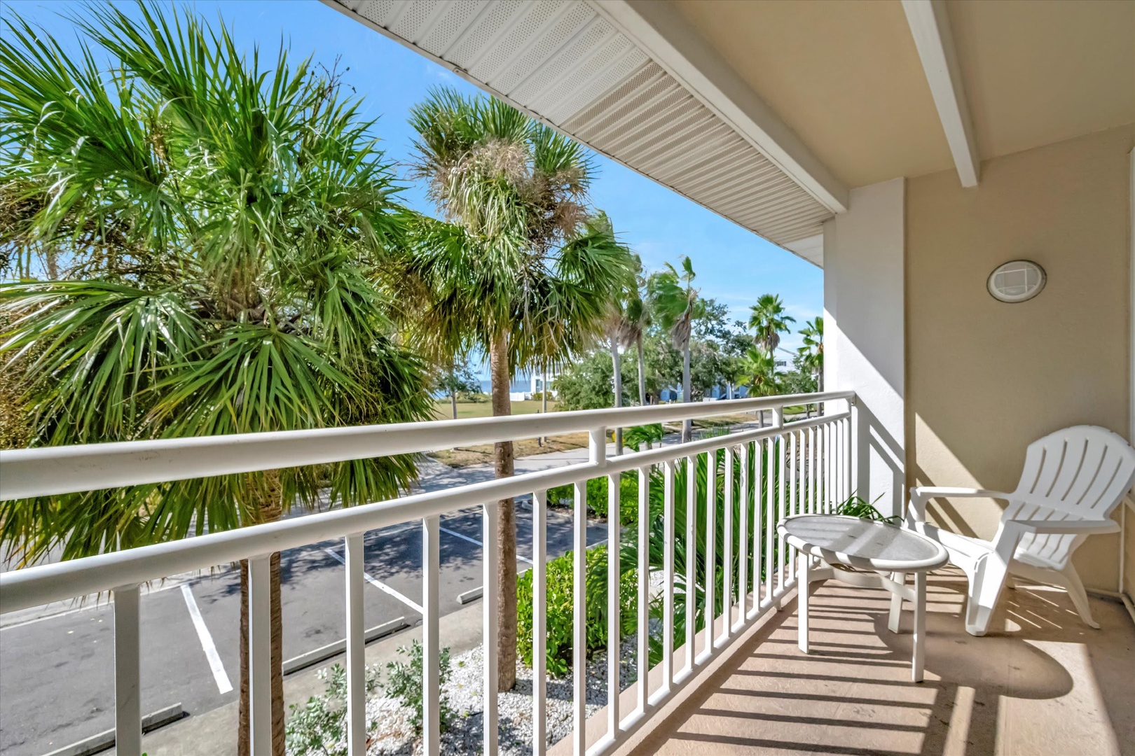 Step out onto your private balcony and feel the warm sun on your skin while palm trees sway gently in the tropical breeze—a perfect spot to unwind with morning coffee or evening cocktails.