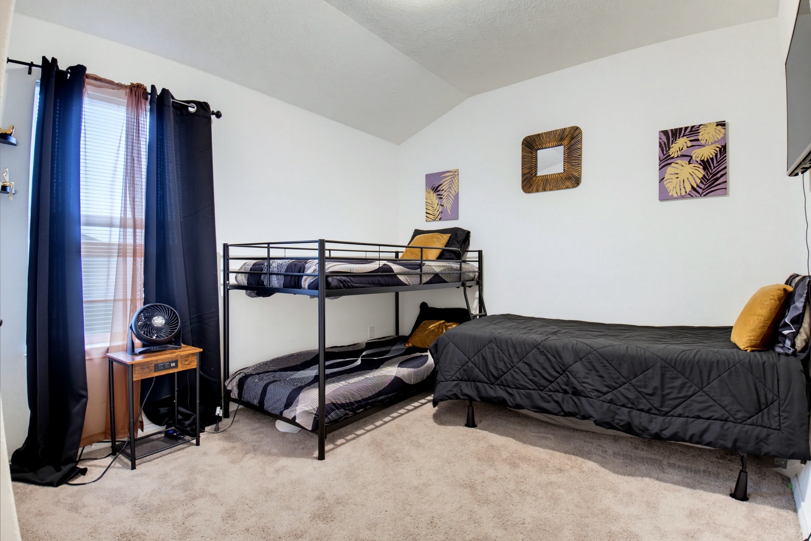 Settle into this peaceful bedroom where you'll find flexible sleeping arrangements with a bunk bed and a twin bed—perfect for families or groups. The calming décor and soft natural light create a restful retreat after your adventures.