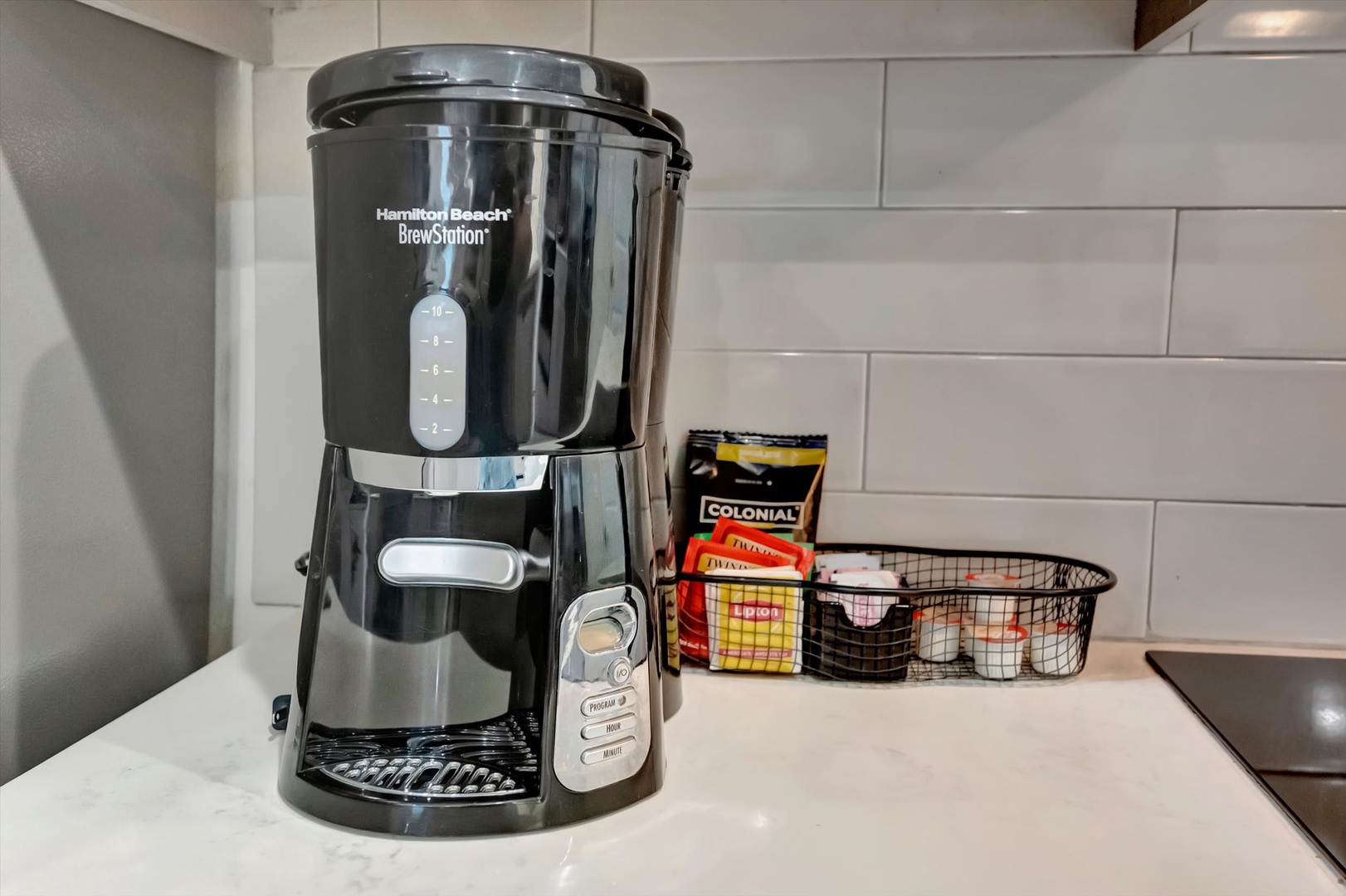 Wake up to fresh coffee waiting for you. This convenient coffee maker is stocked with essentials so you can brew your perfect cup right in the comfort of your kitchen.