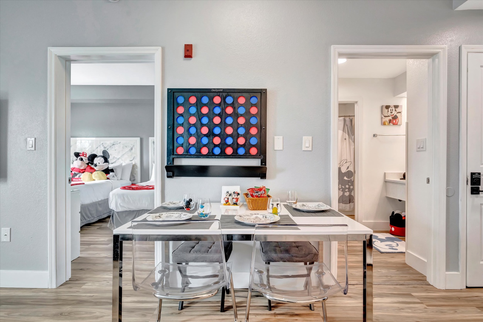 Gather around your dining table for family fun time, with a giant Connect Four game ready for friendly competition and a cozy bedroom just steps away for when little ones need a nap.