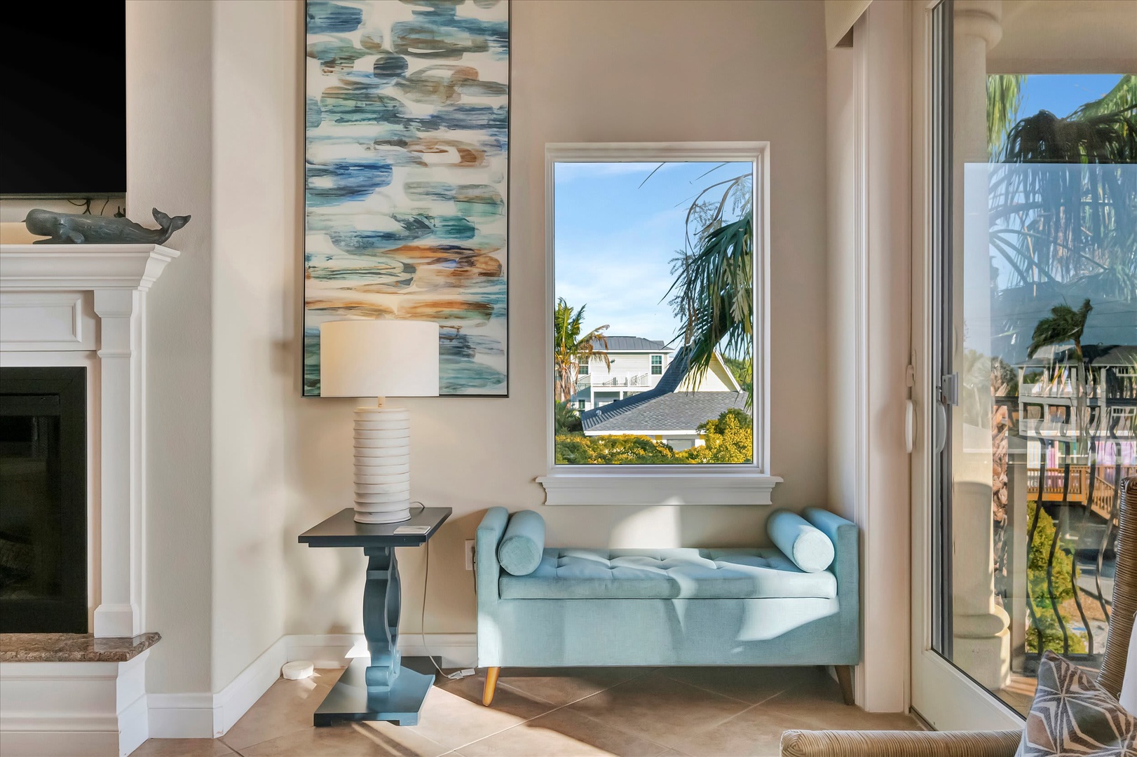 Settle into your cozy reading nook where natural light pours in and a nearby balcony invites you to step outside. The space feels airy, calm, and perfect for unwinding.