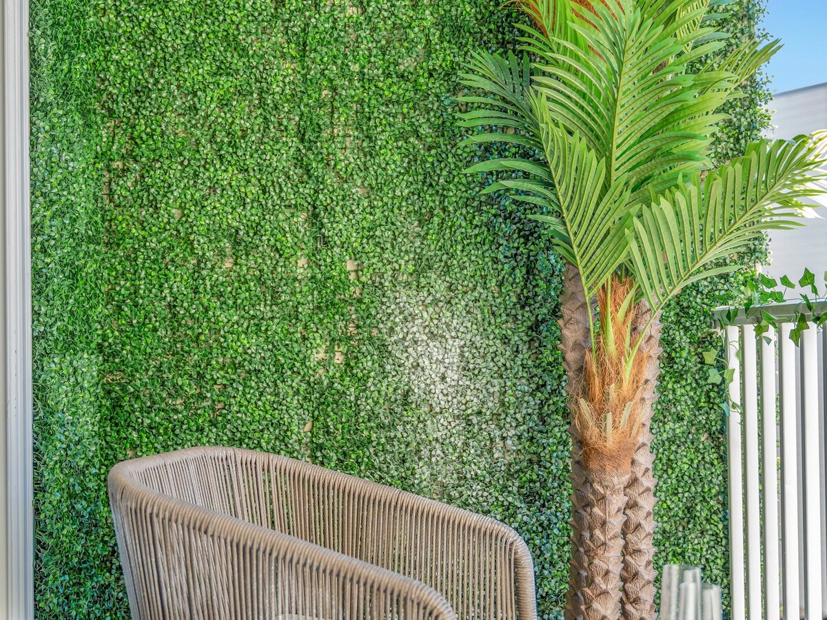 Relax in your own tropical oasis, where lush greenery and natural textures create a serene, private escape perfect for unwinding after a day of adventure.
