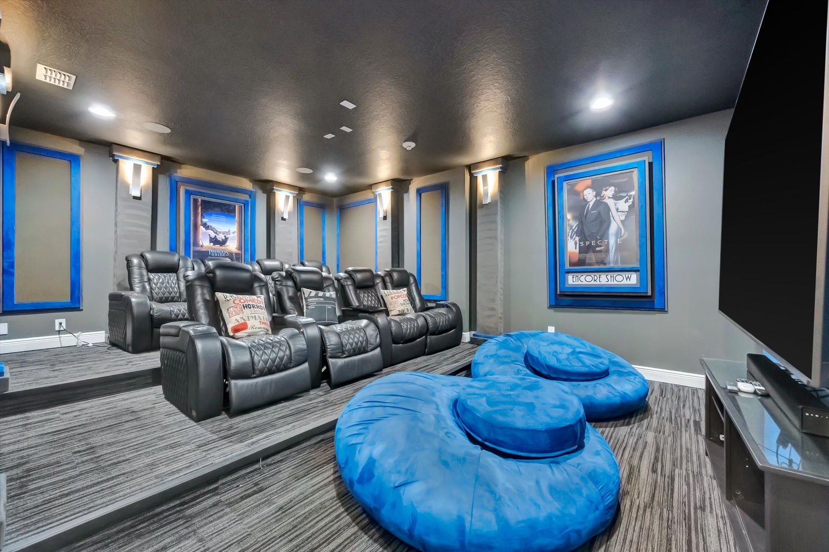 Step into your private home theater with plush stadium seating and cozy oversized loungers—perfect for movie nights and unforgettable entertainment with family and friends.