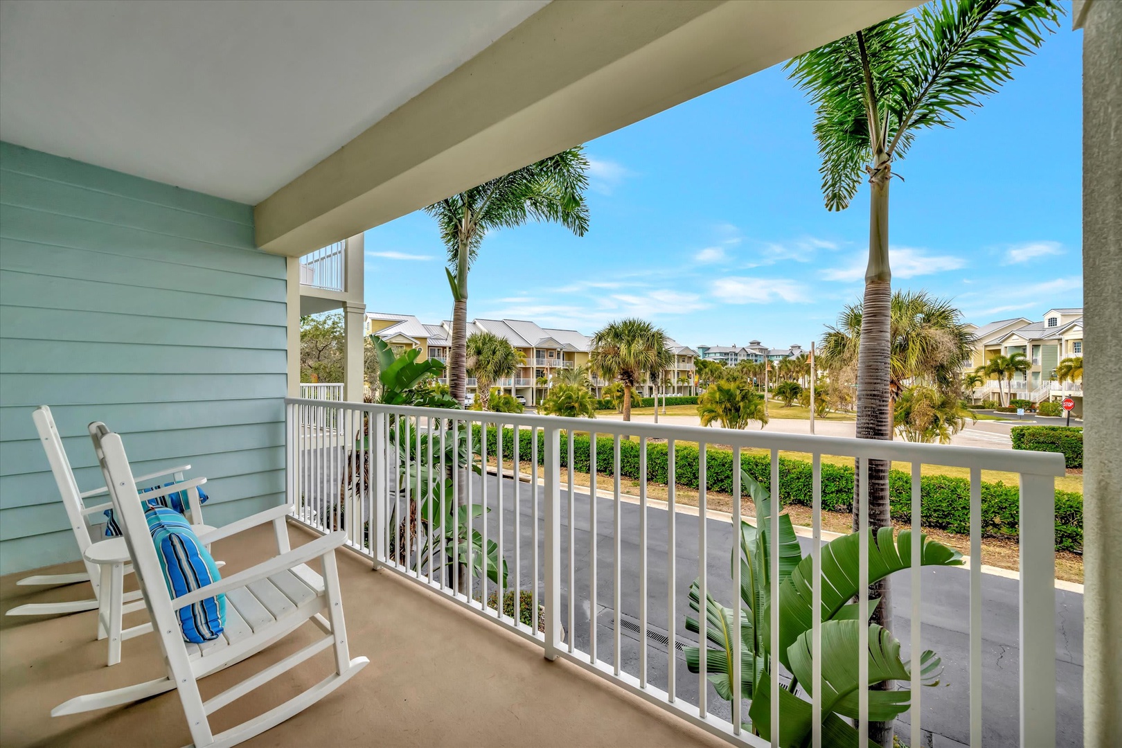 Settle into your private balcony with a good book and let the tropical breeze wash over you as palm trees sway just beyond your railing. The perfect spot to unwind with your morning coffee or evening glass of wine.