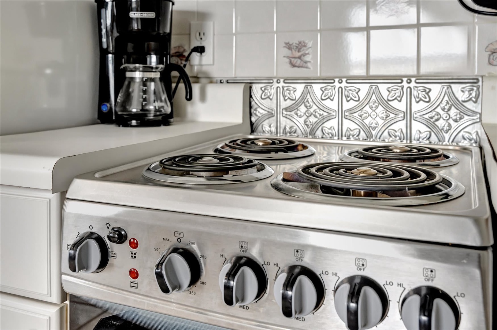 Cook your morning coffee and whip up homemade meals with ease at this fully equipped kitchen, complete with a stove and all the essentials you need to feel at home.