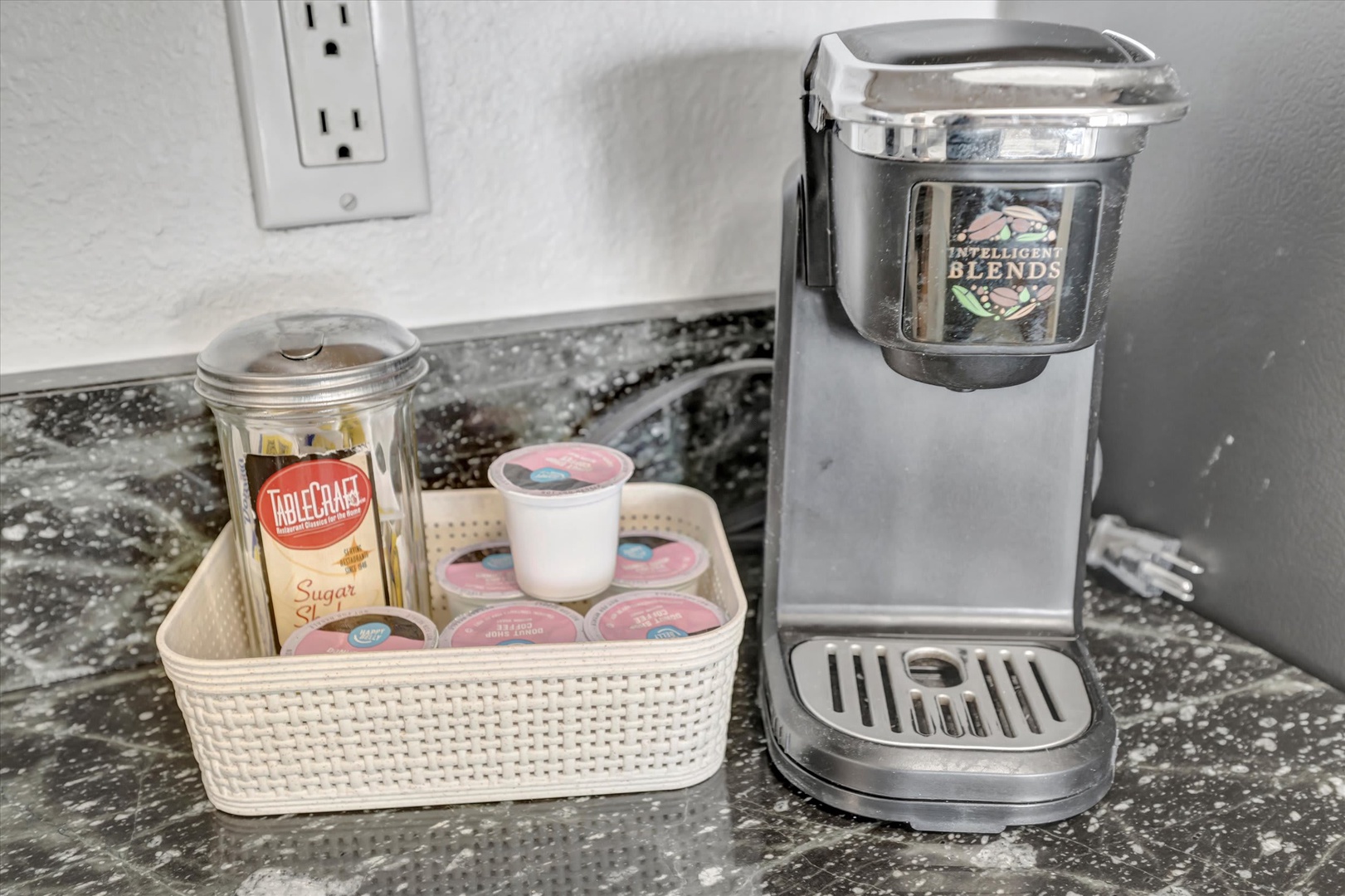 Start your mornings right with your own single-serve coffee maker and assorted pods, plus sugar and creamer—everything you need for that perfect cup.