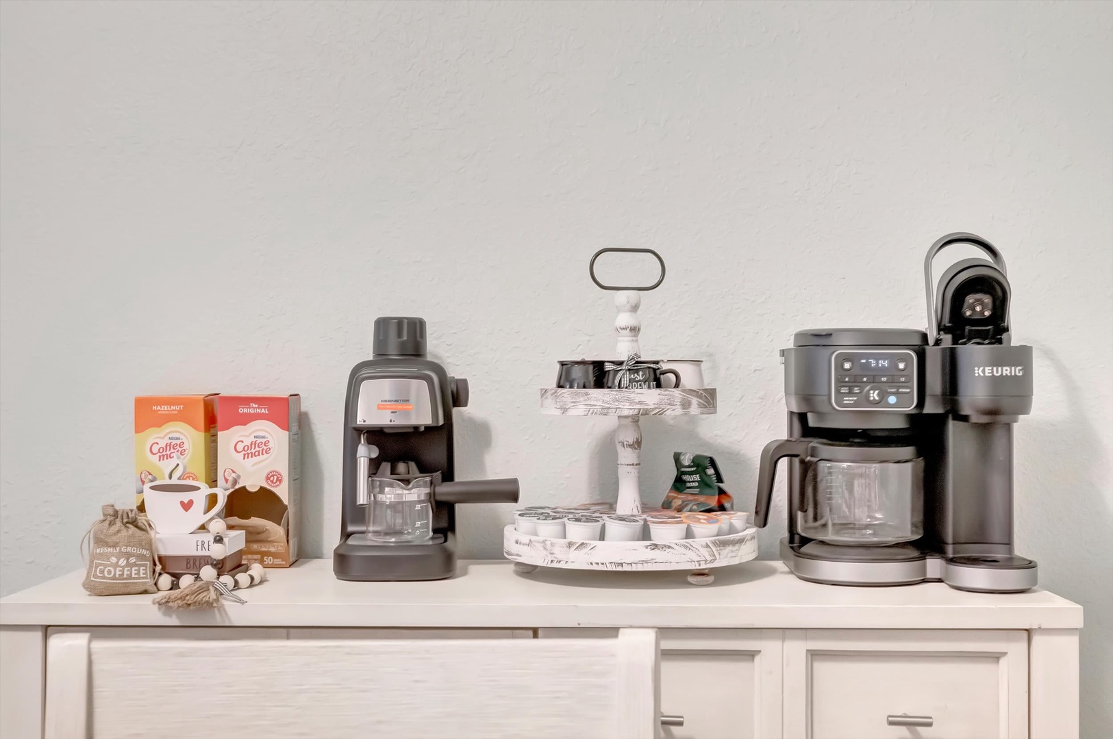 Start your mornings with ease at your personal coffee station, stocked with everything from espresso to K-cups and creamer—your perfect cup awaits.