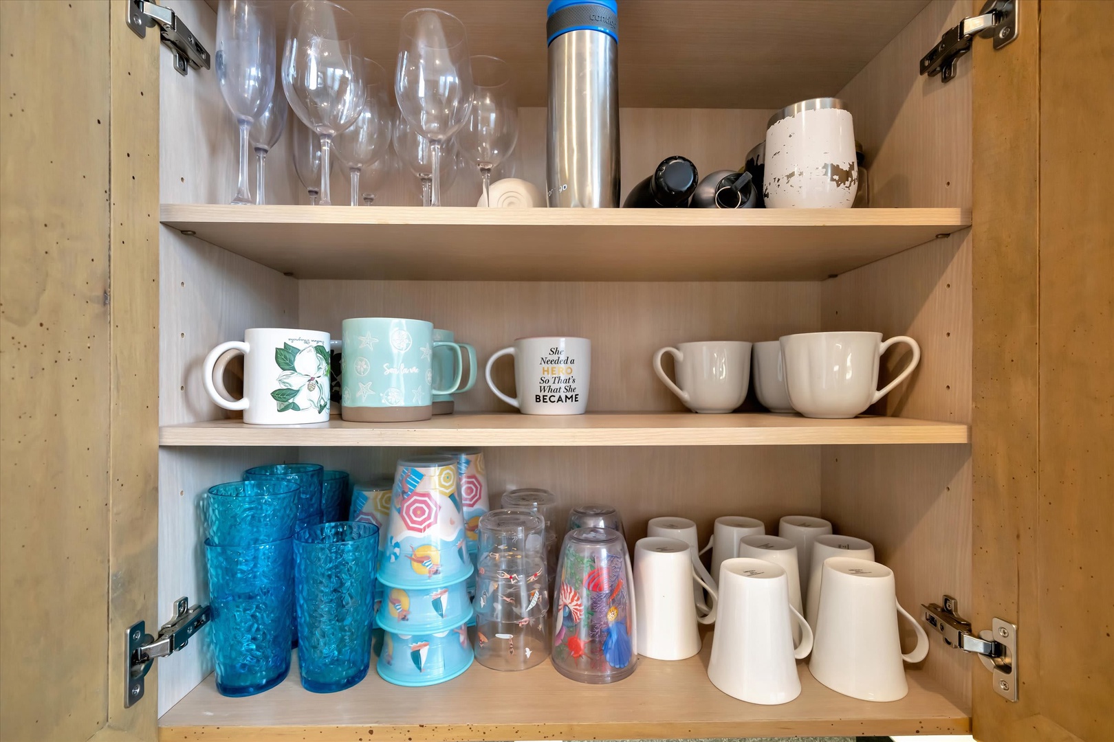 Everything you need for your morning coffee or evening wine is right here, neatly arranged and ready for you to enjoy your favorite beverages in style.
