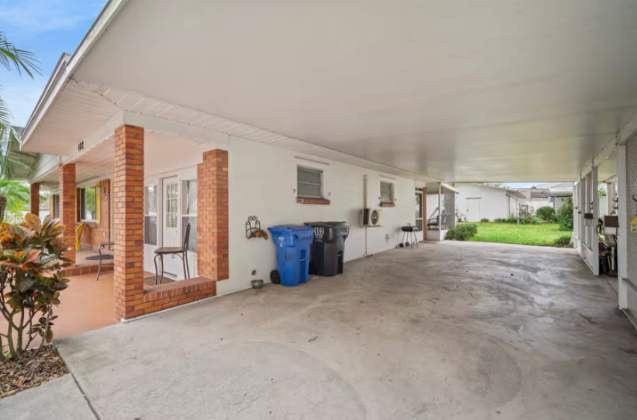 Protected parking space with easy access to your rental and views of the landscaped grounds beyond.