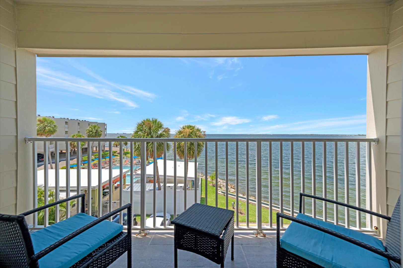 Relax in your private balcony seating as gentle ocean breezes and stunning water views create your perfect coastal escape.