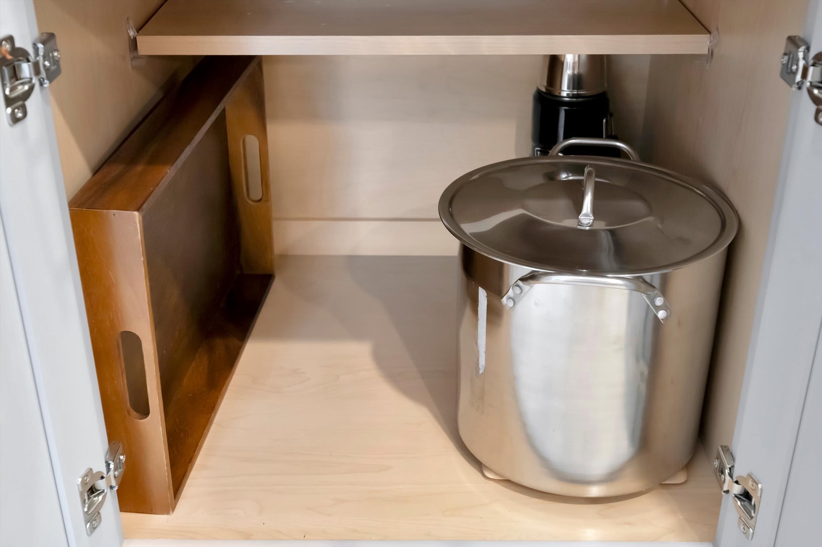 Clever storage keeps your cookware organized and within easy reach—perfect for preparing your favorite home-cooked meals.