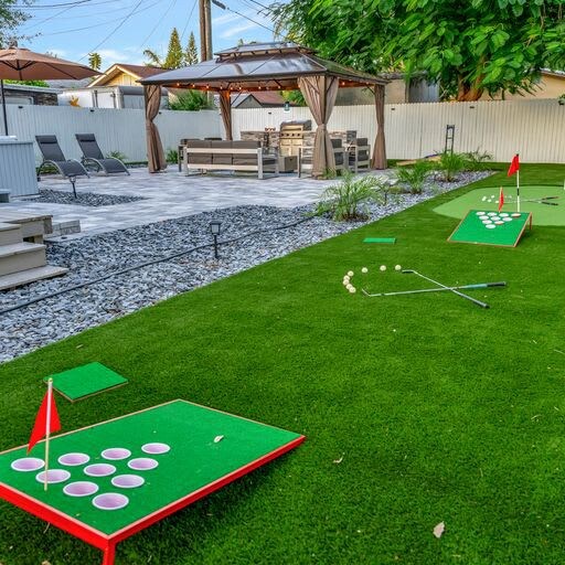 Your private backyard oasis awaits with miniature golf, shaded lounging under the gazebo, and plenty of space to unwind with friends and family.
