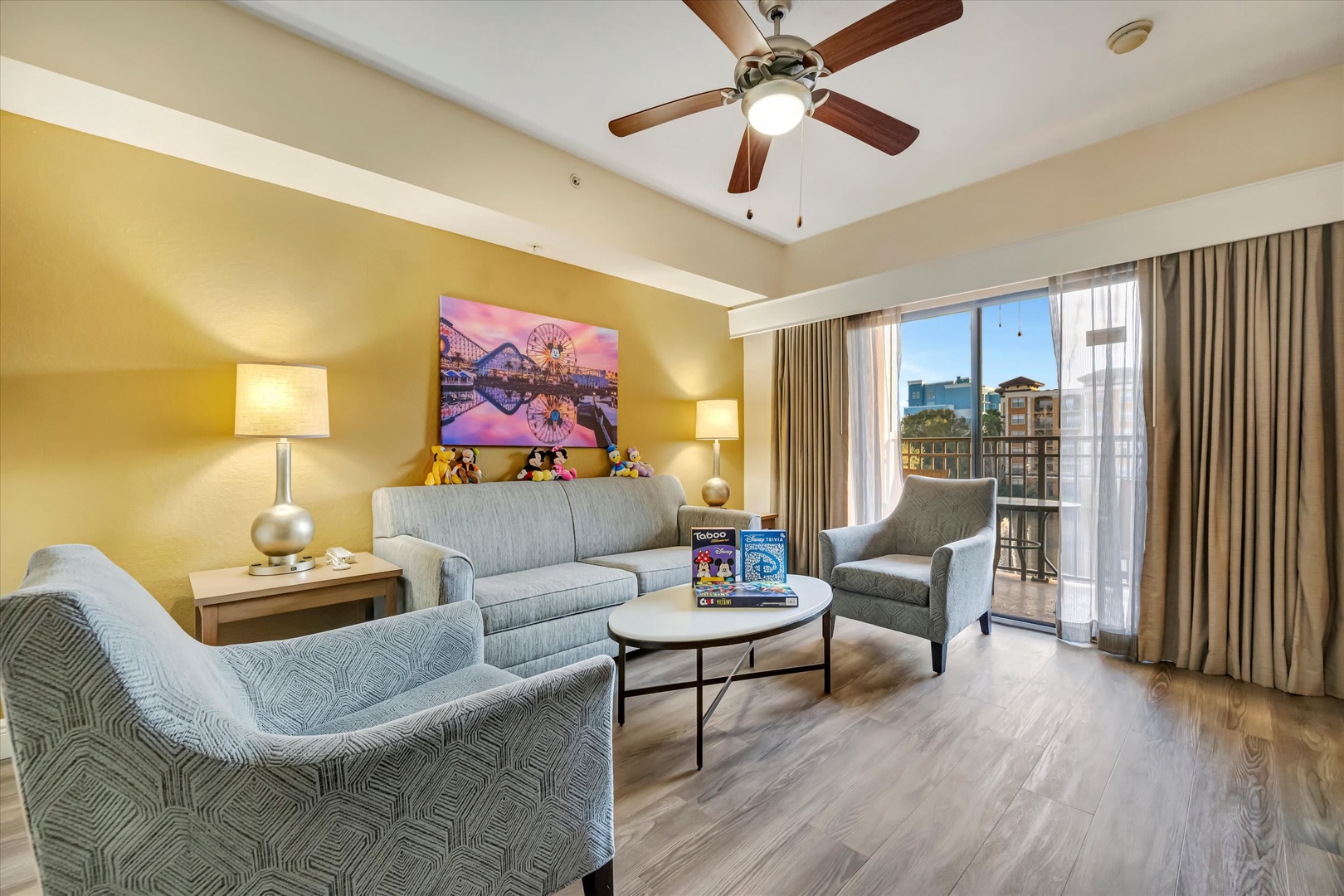 Unwind in your inviting living space with comfortable seating, stylish décor, and natural light streaming through the balcony doors. Your home away from home awaits.