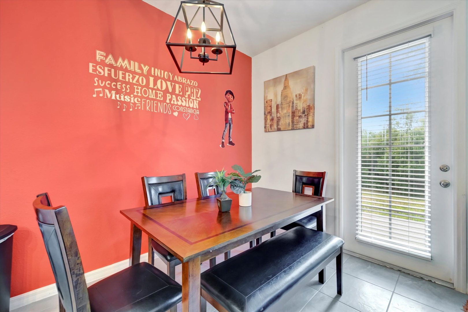 Gather around the warm, inviting dining table where your group can share meals and make memories together. The stylish pendant lighting sets a cozy mood for breakfast plans or evening conversations.