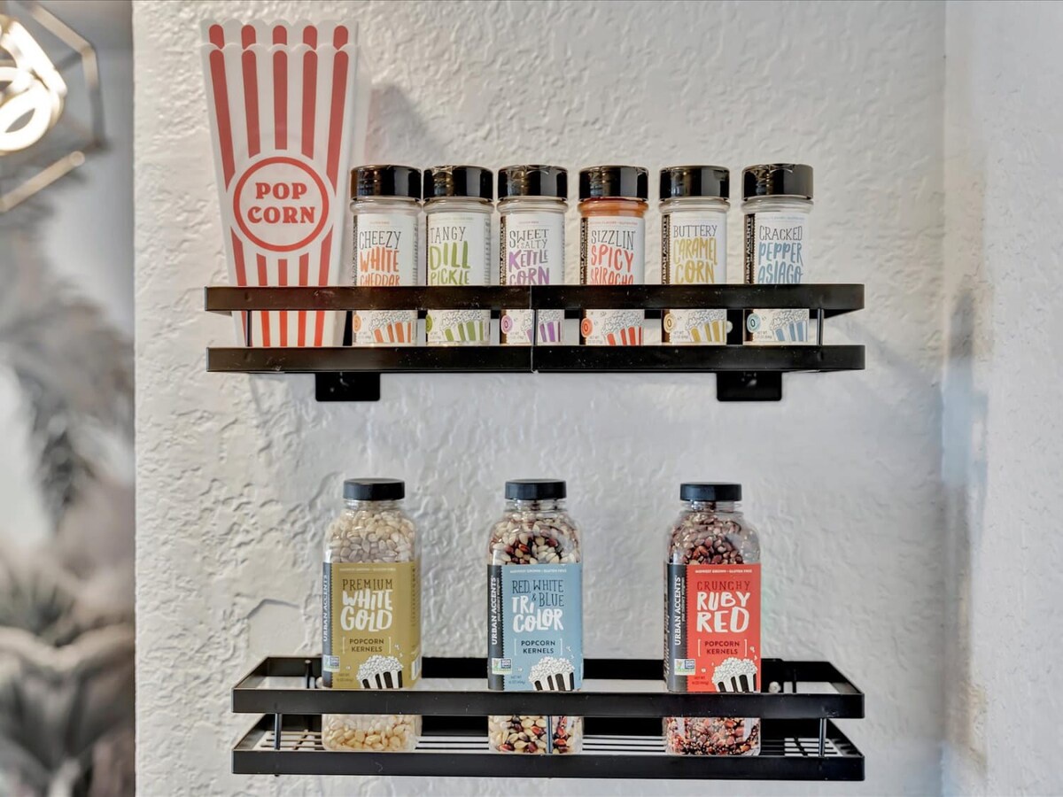 Movie night just got sweeter! Your popcorn station features gourmet kernels and tempting seasonings—perfect for creating your own theater-style treats.