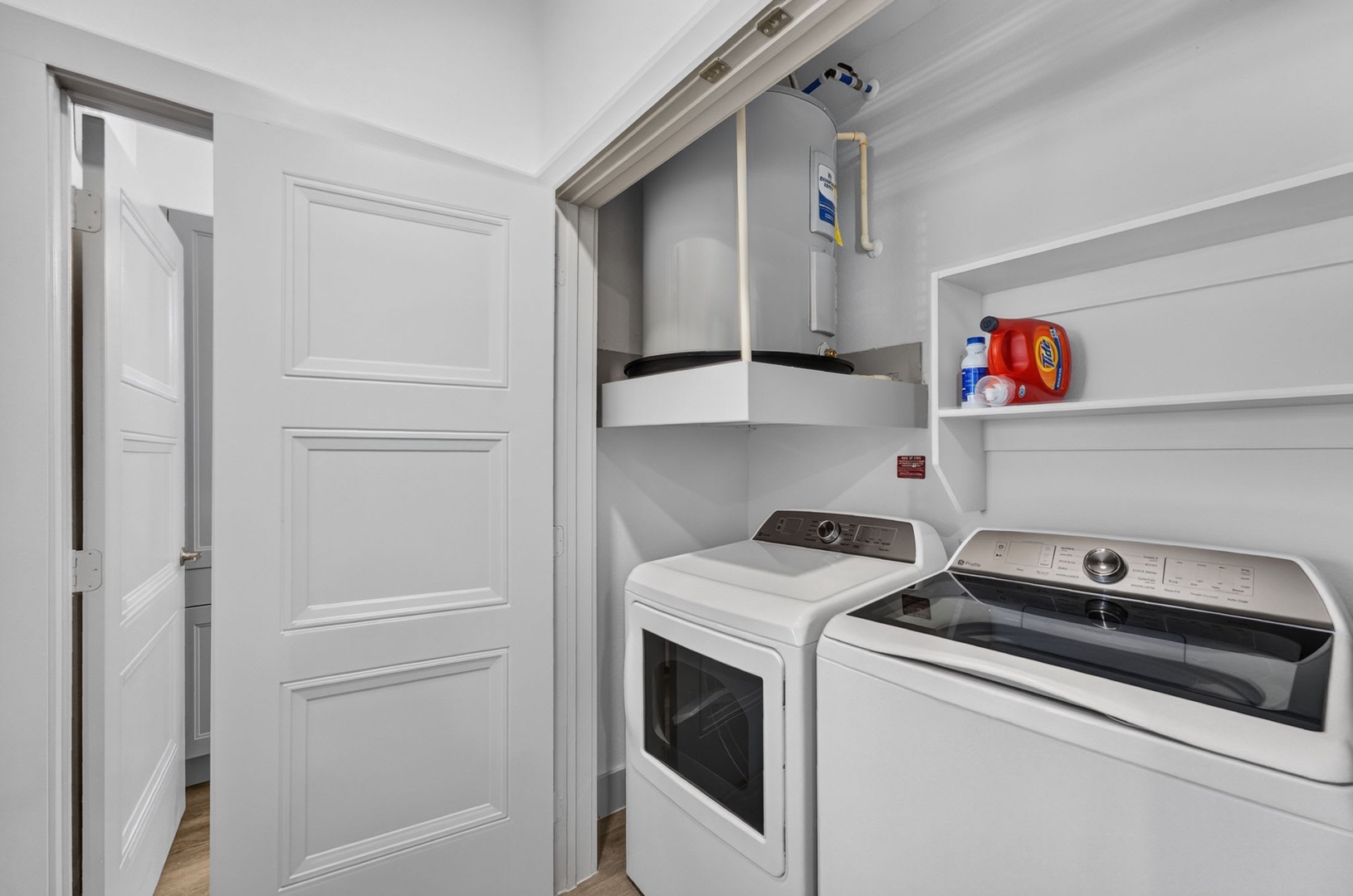 Your dedicated laundry space features full-size appliances and thoughtful storage, making it easy to keep fresh during your stay without packing extra outfits.