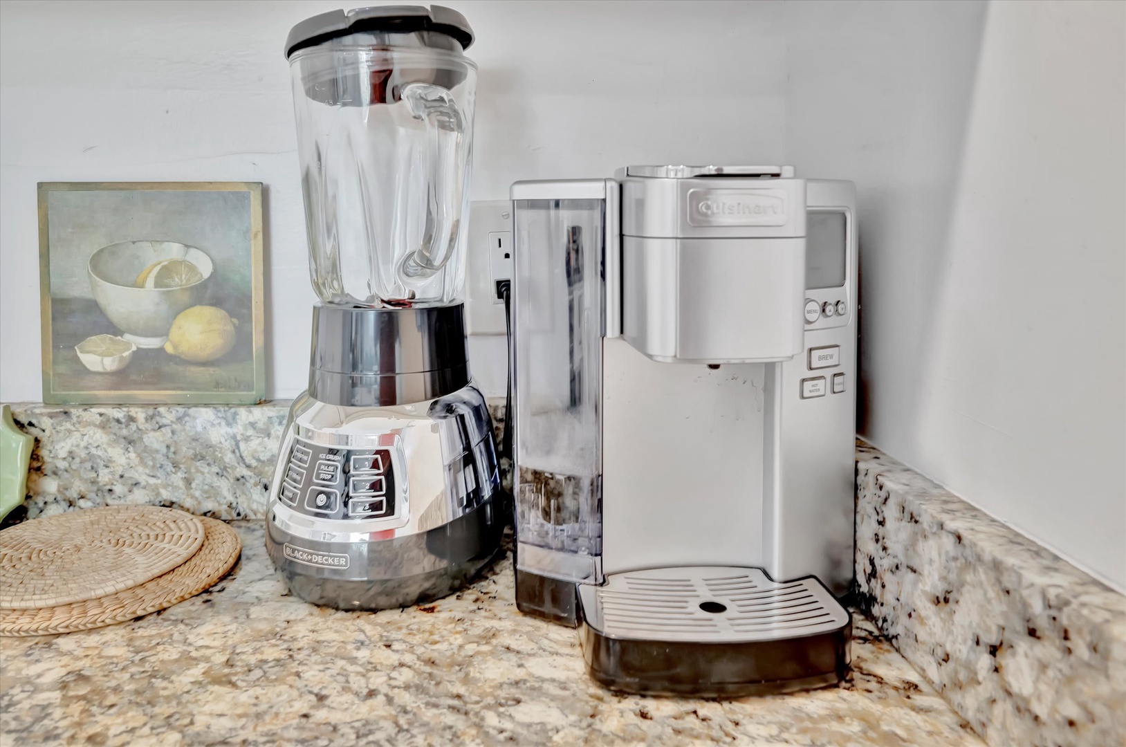 Your kitchen is stocked with a quality blender and coffee maker, ready to help you prepare your morning smoothie or brew a perfect cup of coffee before your day begins.
