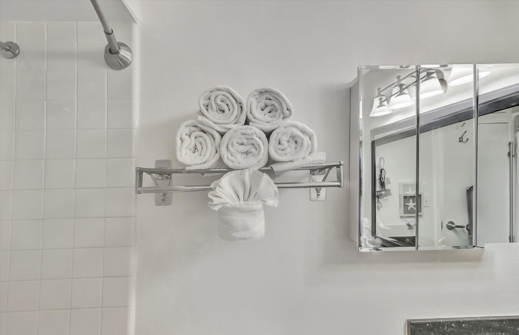 Fresh, fluffy towels await you in your bright, spa-like bathroom—everything arranged for ultimate comfort and relaxation.