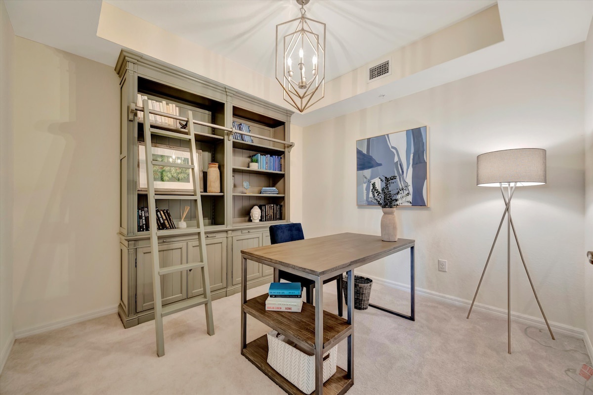 Your private workspace awaits—soft natural light, soaring vaulted ceilings, and plenty of built-in storage help you stay focused and comfortable throughout your stay.