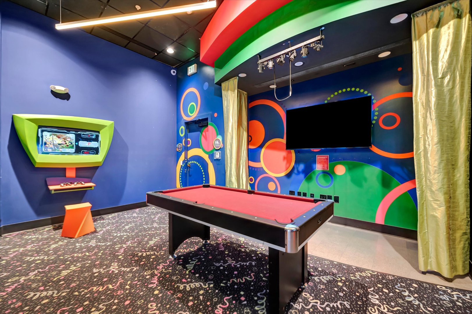 Challenge friends to a game of pool or dive into arcade fun in this vibrant game room—your own private entertainment hub for hours of playful competition and laughter.