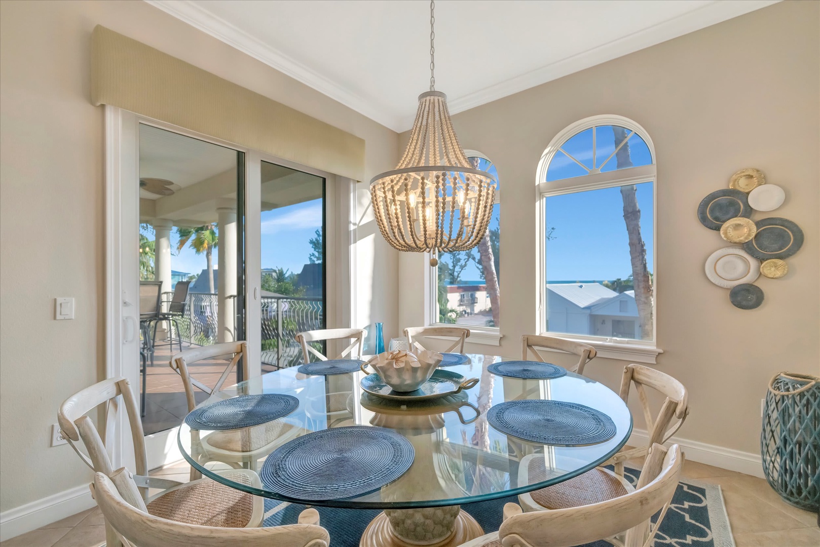 Gather around this elegant dining table with stunning ocean views—your mornings and meals become moments to savor, framed by coastal light and breezes from your private balcony.